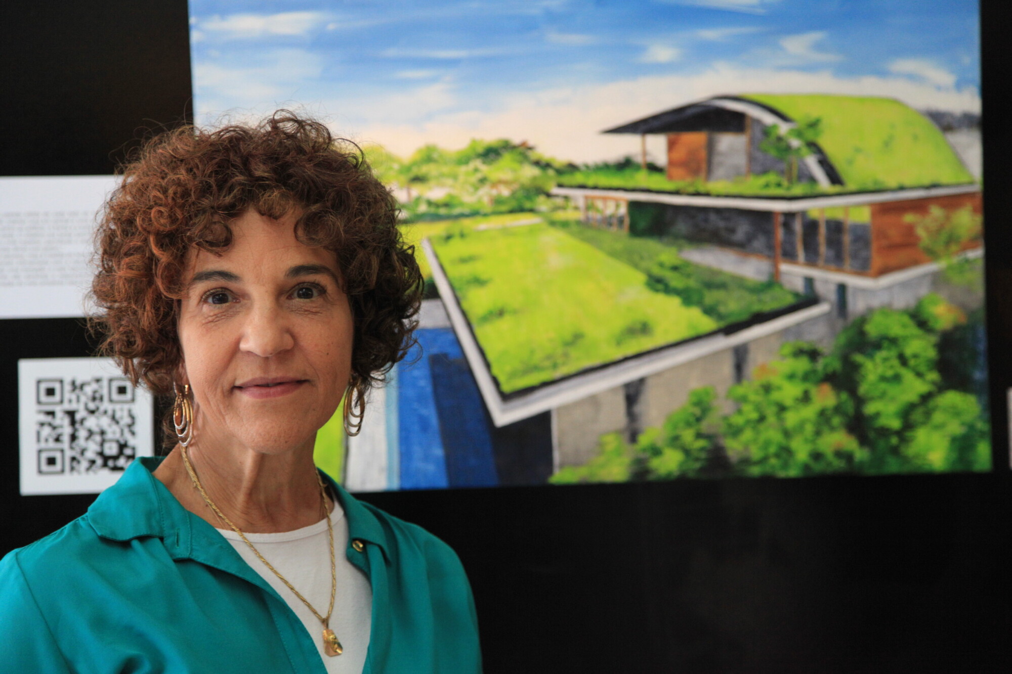 Arquiteta pinta quadros para chamar a atenção para construções sustentáveis